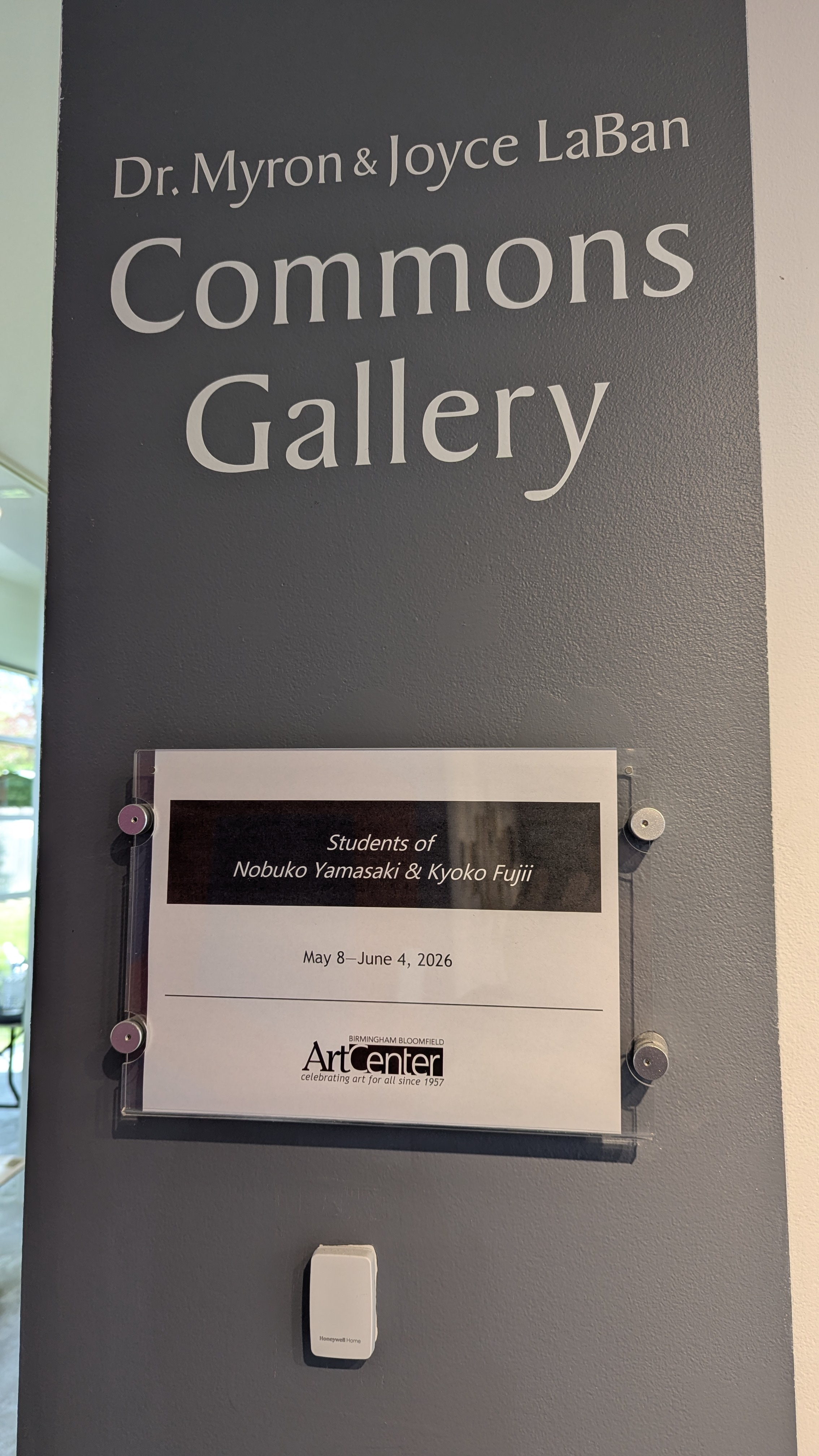 Gallery signage: Dr. Myron & Joyce LaBan Commons Gallery, Students of Nobuko Yamasaki & Kyoko Fujii, May 8 – June 4 2026, Birmingham Bloomfield Art Center