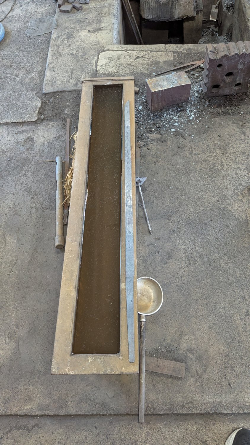 The clay-coated blade ready for the quench